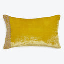 Elegant gradient throw pillow with lace trim adds luxurious touch.