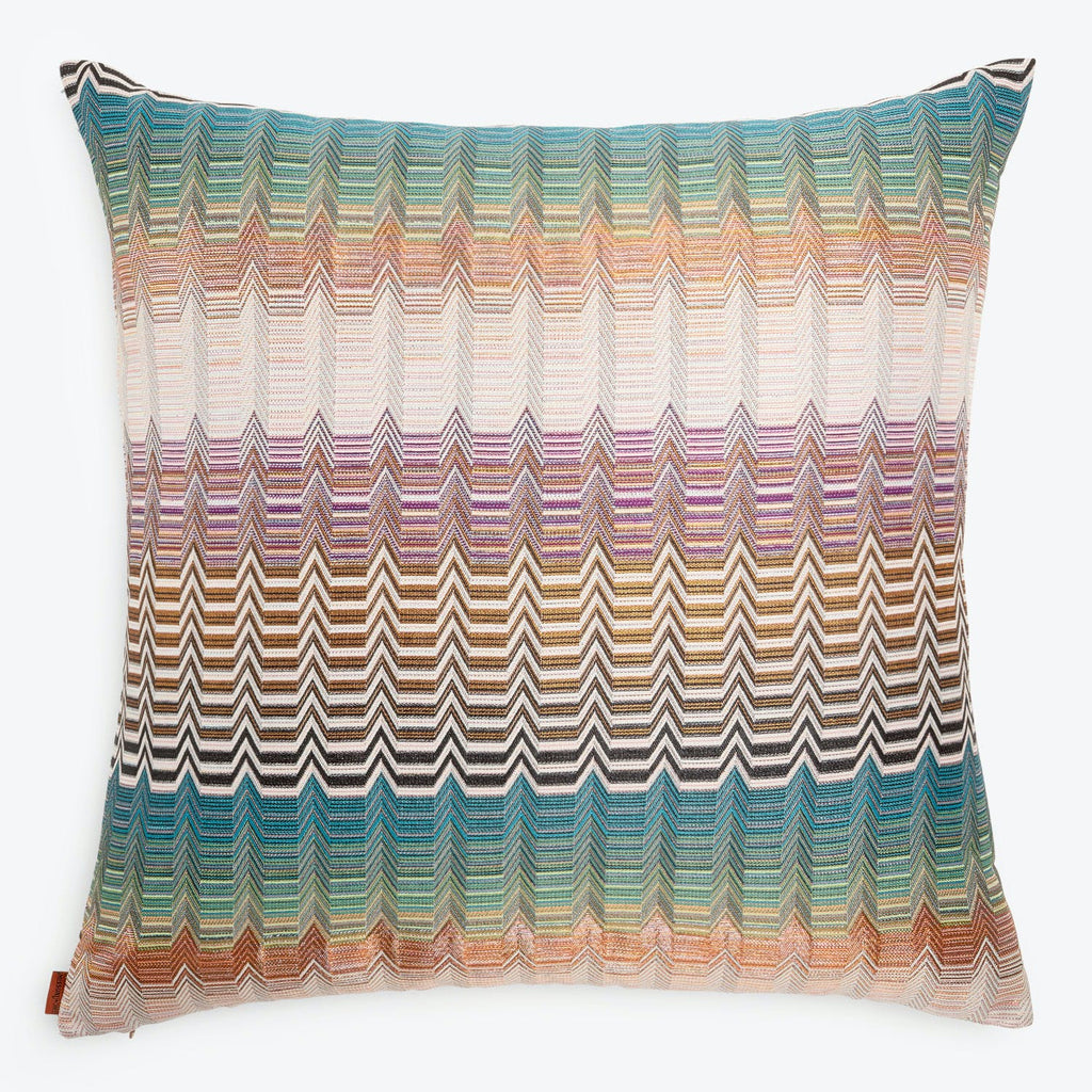 Square decorative pillow with vibrant multicolored chevron pattern on white background.