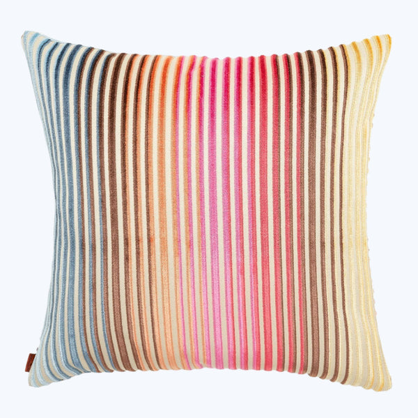 Square decorative pillow with colorful striped pattern and tassels.