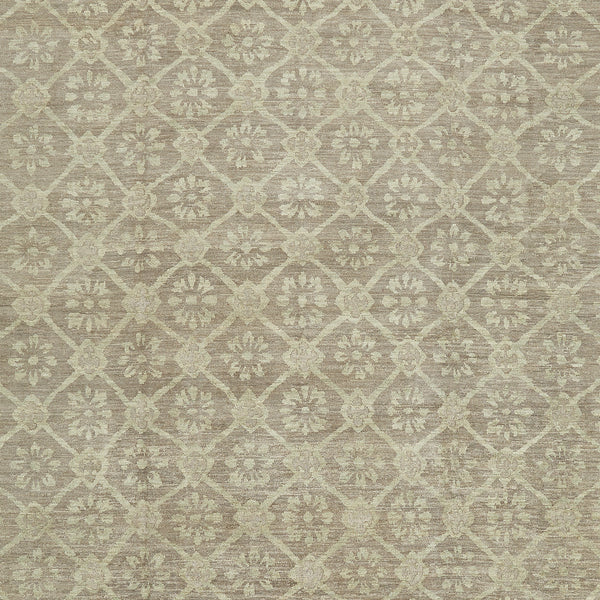 Elegant diamond-shaped pattern with intricate floral details on a carpet.