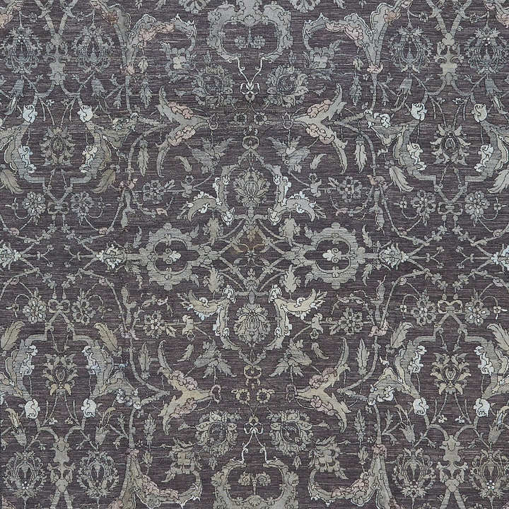 Traditional, intricate fabric pattern with muted colors and symmetrical design.