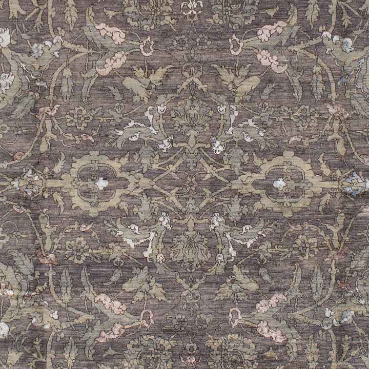 Intricate floral and vegetative motifs create a vintage rug design.