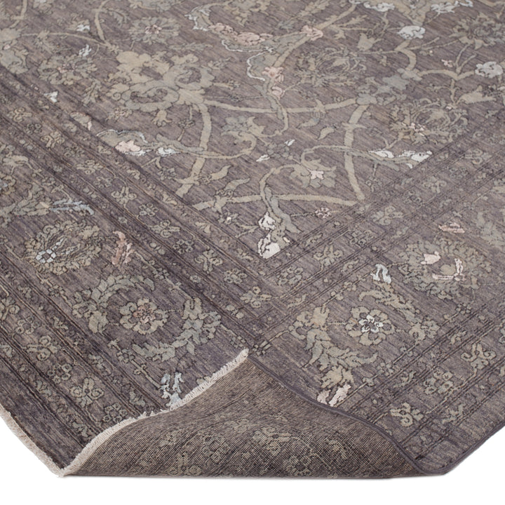 Elegant dark rug with intricate floral pattern adds depth and sophistication.