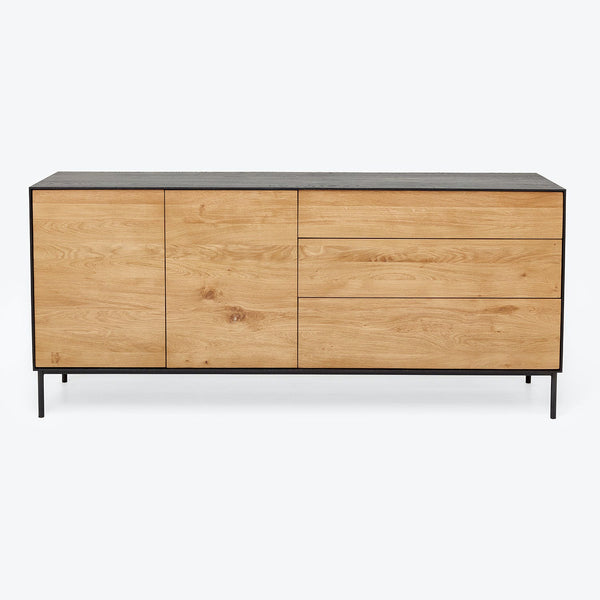 Contemporary minimalist sideboard with light wood finish and sleek design.