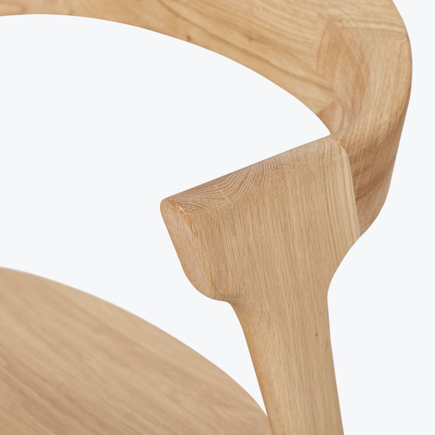 Close-up of a finely crafted wooden chair detail with seamless joinery.