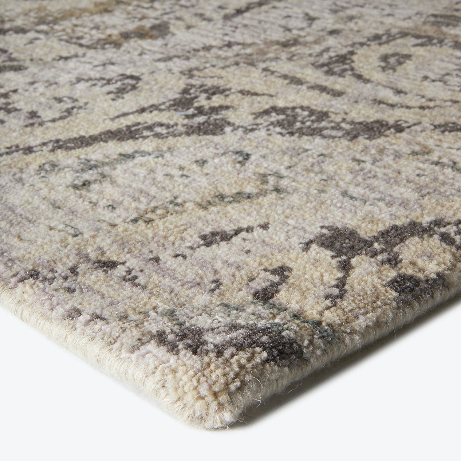 Abstract marbled area rug with a plush and cozy texture.