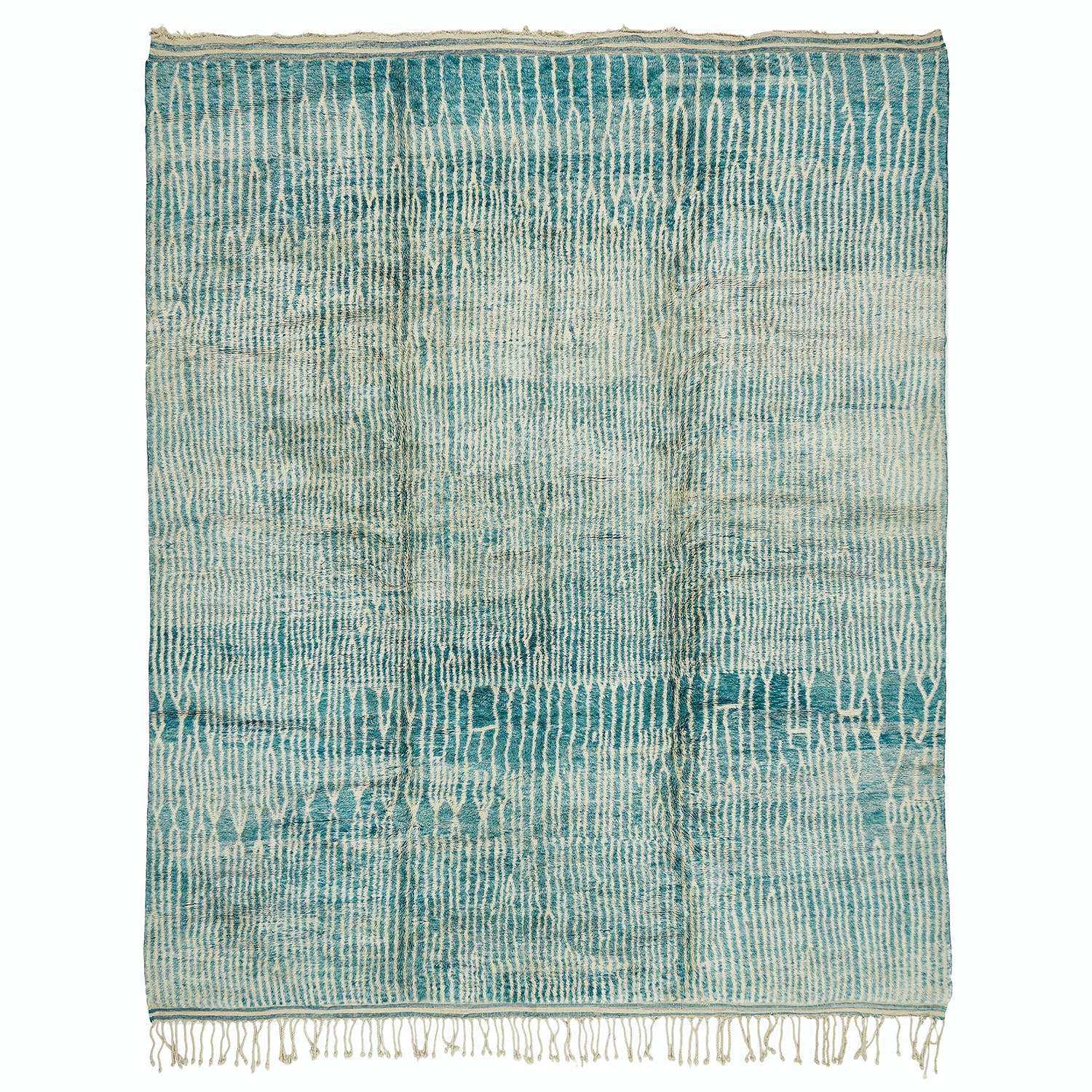 Blue woven textile with organic pattern and fringe details.