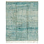 Blue woven textile with organic pattern and fringe details.