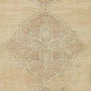 Vintage fabric with symmetrical geometric pattern in muted colors.
