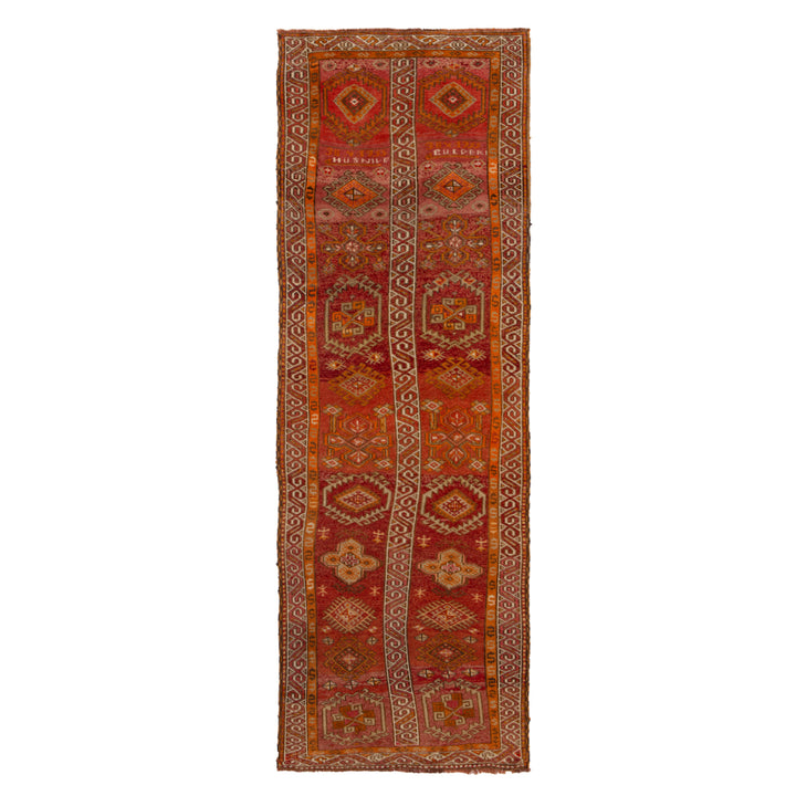 Exquisite handwoven runner rug with vibrant colors and intricate patterns.