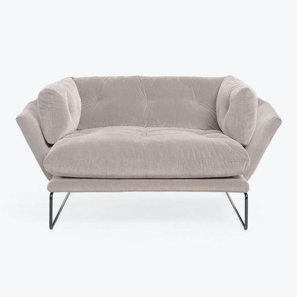 Modern-style sofa with clean lines and plush gray upholstery.