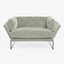 Minimalist modern sofa with plush seating and sleek metal base.