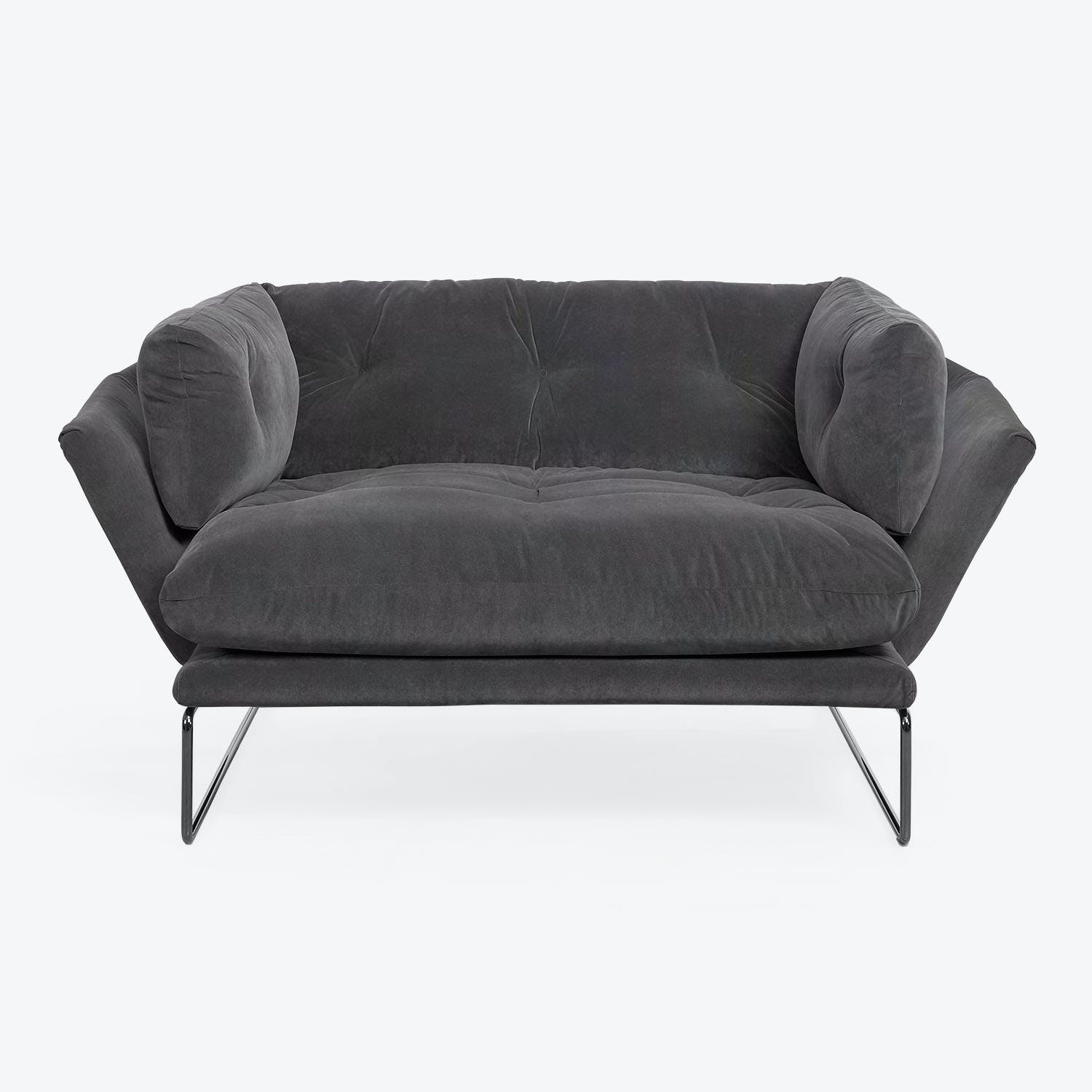 Contemporary charcoal gray sofa with plush cushions and sleek metal frame.