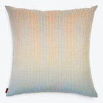 Square pillow with striped pattern in shades of beige, cream, and blue