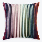Colorful decorative pillow with textured cover showcasing various vibrant stripes.