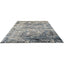 Vintage-inspired distressed rug in shades of blue and grey.