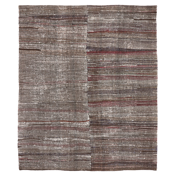 Traditional handwoven textile featuring complex pattern in neutral and red hues.
