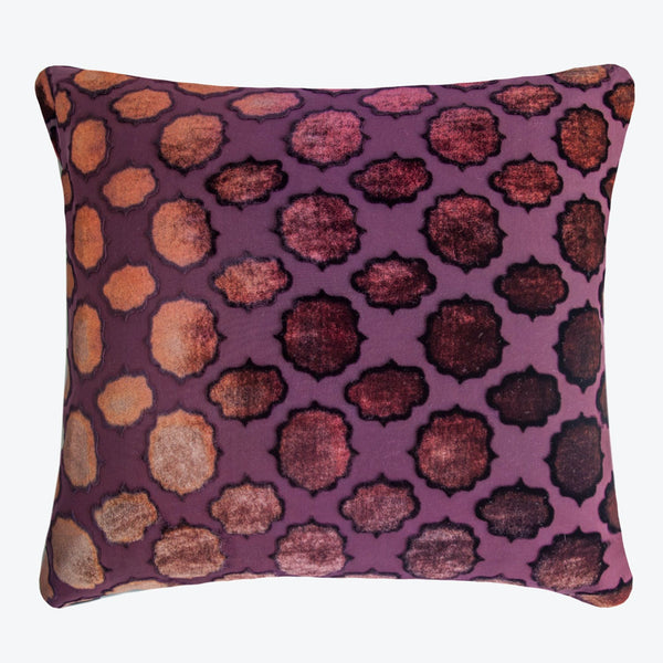 Square pillow with abstract animal print in shades of brown and purple.