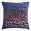 Vibrant geometric pillow with a gradient color scheme adds flair