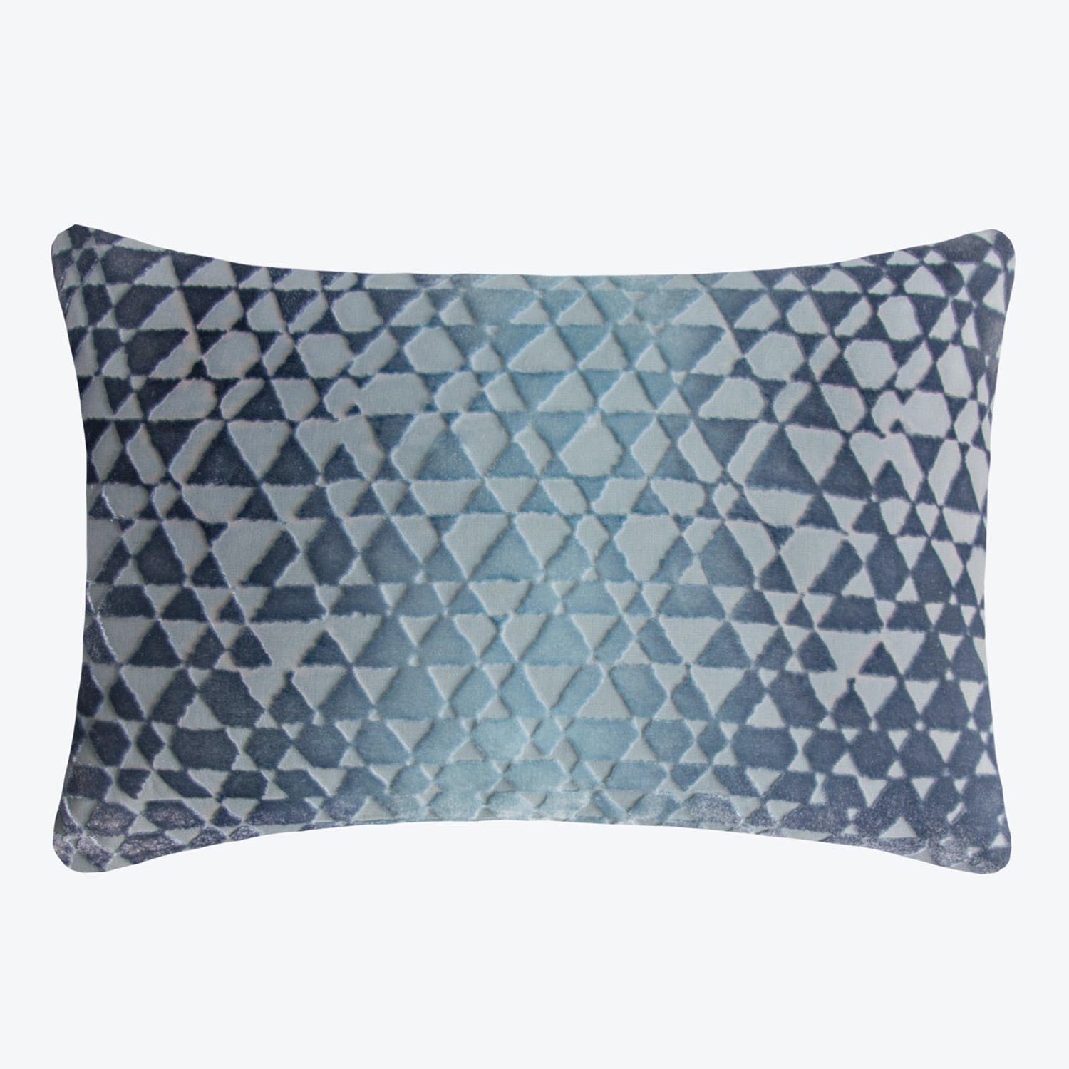 Rectangular decorative pillow with ombre triangle pattern in blue-gray shades.