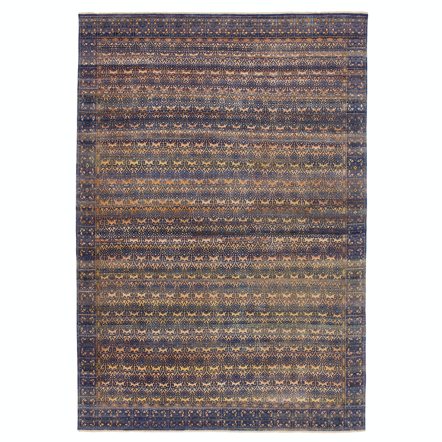 Vintage oriental rug with intricate patterns and muted color scheme.
