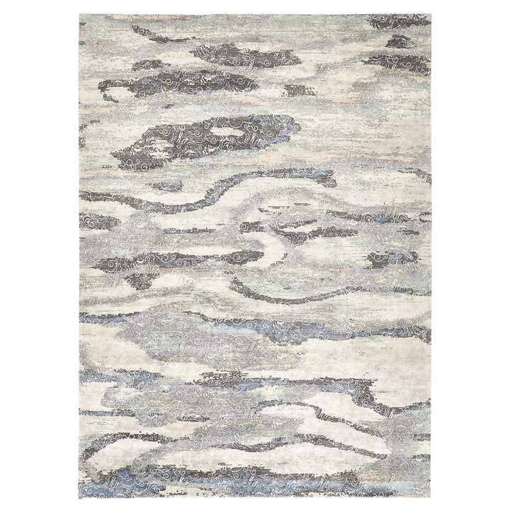 Abstract rug with distressed texture in shades of gray and black