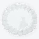 Elegant white plate with textured surface and ruffled rim design.