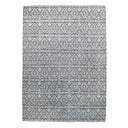 Rectangular area rug with intricate geometric and floral pattern design.