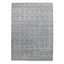 Rectangular area rug with intricate geometric and floral pattern design.