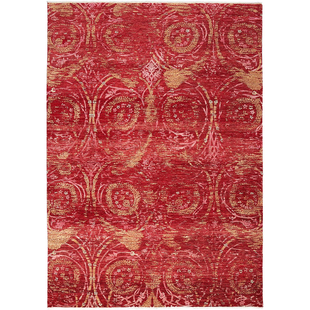 Richly textured circular patterned area rug with vintage distressed look.