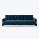 Modern, deep blue sofa with clean lines and plush cushions.