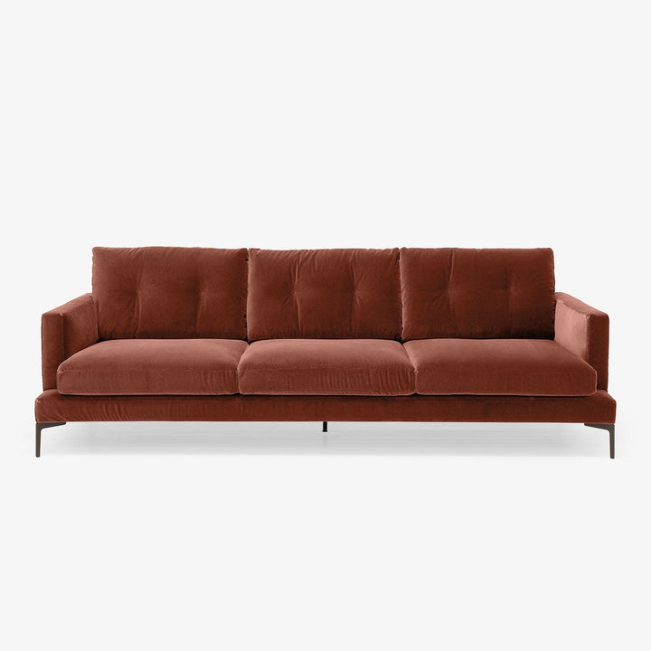 Contemporary three-seater sofa in terracotta upholstery exudes warmth and comfort.