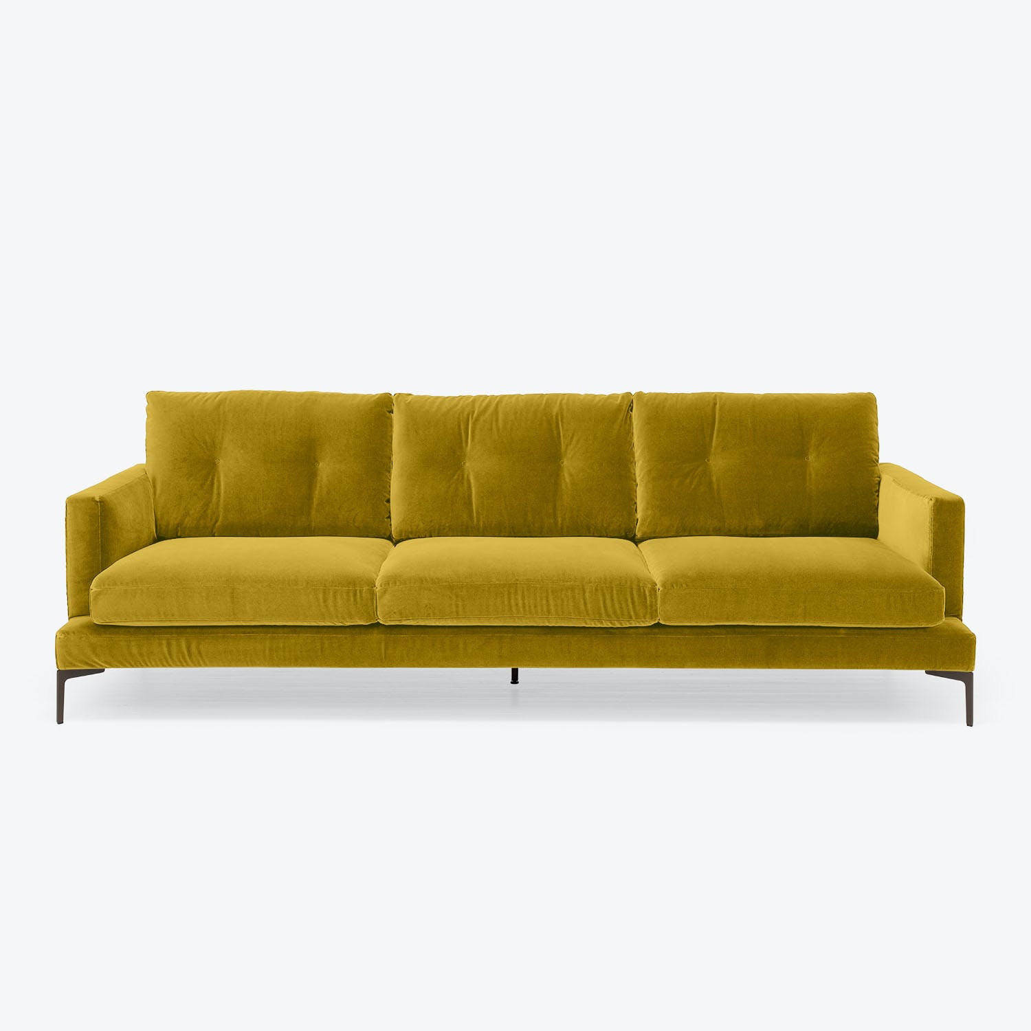 Modern three-seater sofa in bold mustard velvet with sleek design.