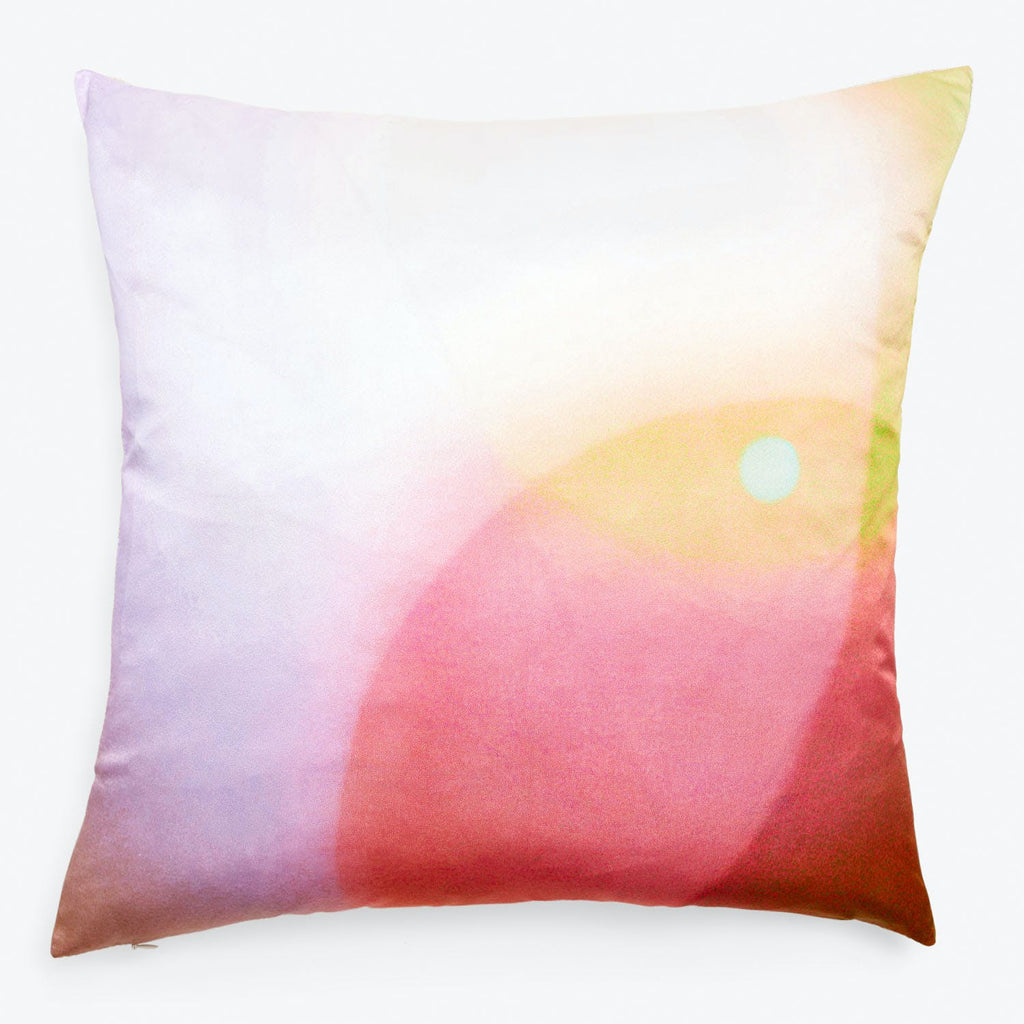 Square pillow with soft pastel colors creates dreamy, abstract design.