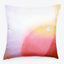 Square pillow with soft pastel colors creates dreamy, abstract design.