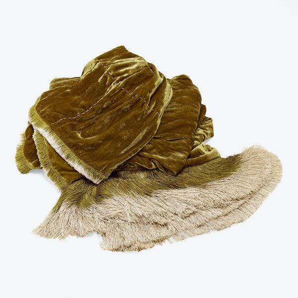 Soft and velvety olive green fabric with decorative fringe detailing.