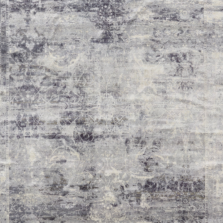 An aged, floral-inspired fabric pattern with intricate details and monochromatic tones.