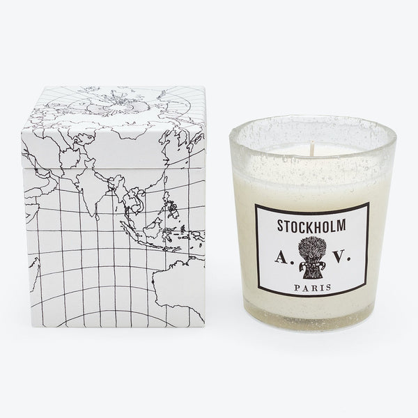 Minimalistic map-themed box and scented candle with vintage label.