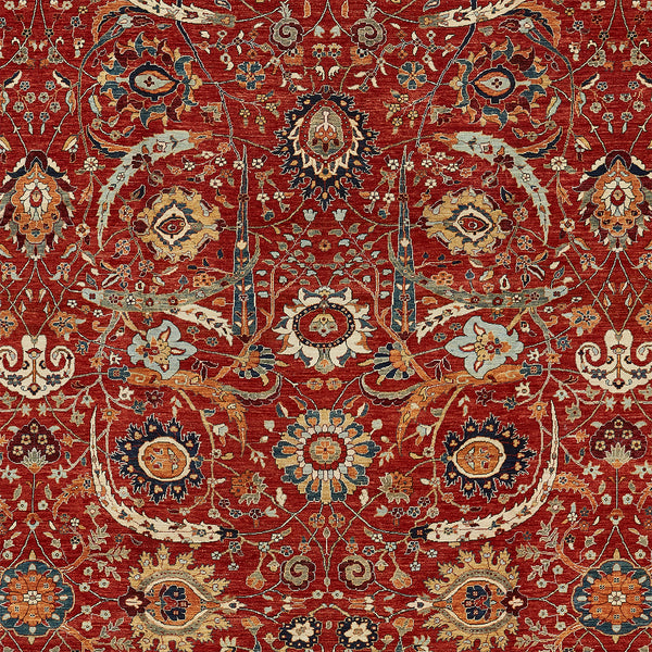 Exquisite Persian-inspired carpet with intricate symmetrical design and vibrant colors.