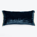 Rectangular deep blue velvet pillow with gradient effect and trim.