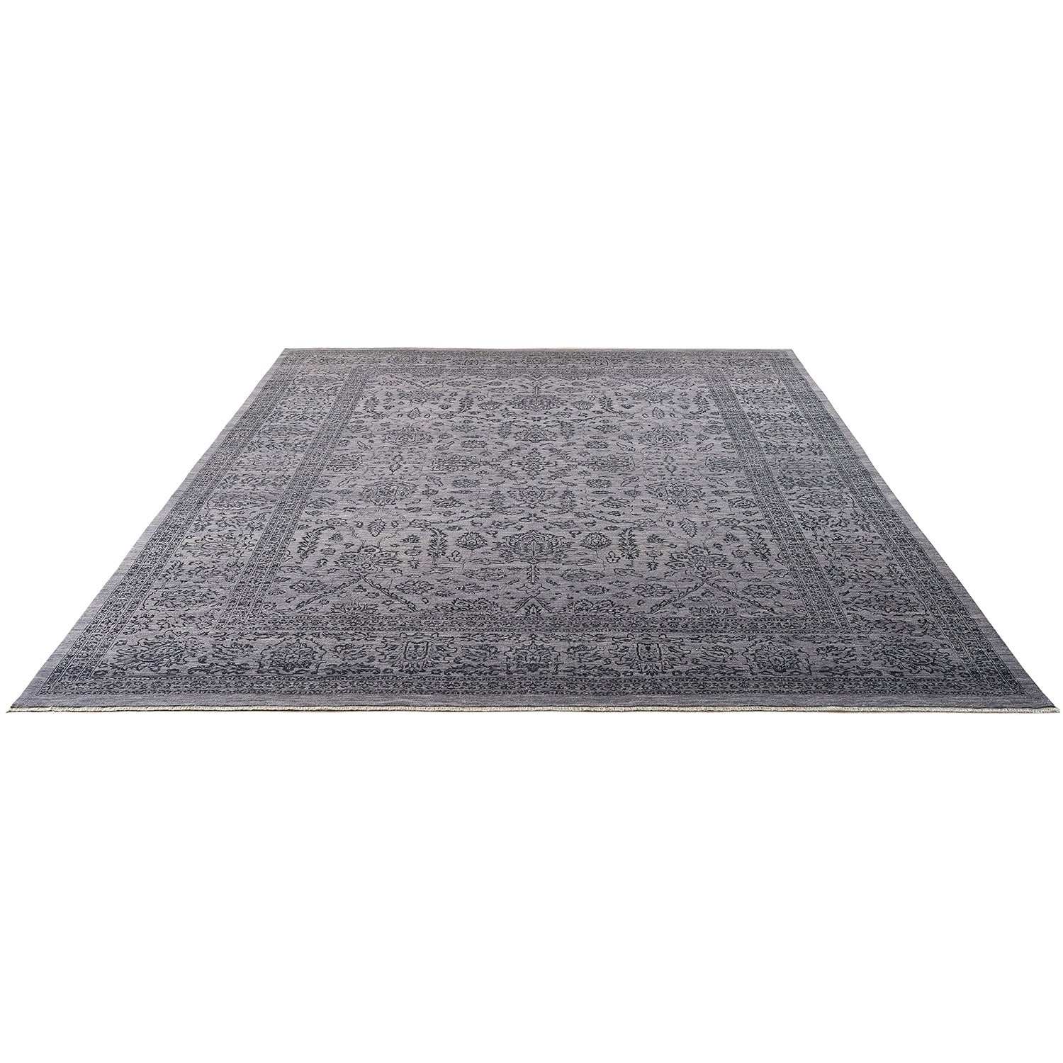 Large monochromatic rectangular area rug with intricate symmetrical design