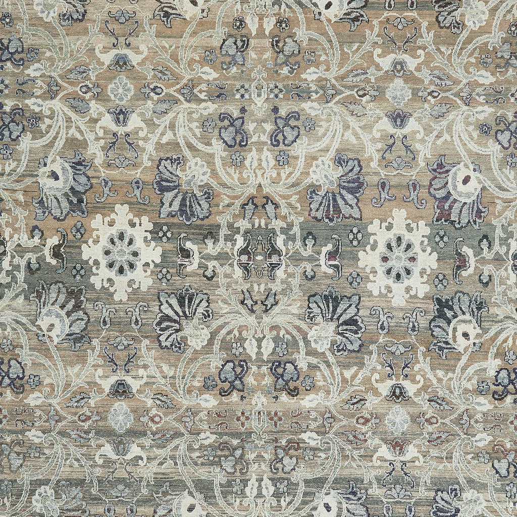 Detailed view of a traditional floral patterned fabric or carpet.