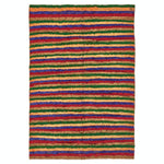 Vibrant, multicolored woven rug showcases traditional craftsmanship and bold patterns.