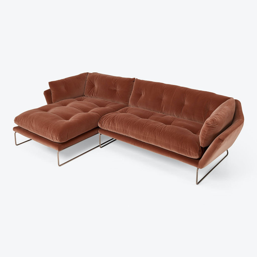 Contemporary sectional sofa with chaise lounge in rich brown fabric.