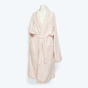 Cozy and stylish, a pale pink bathrobe for ultimate relaxation. - hover