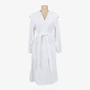 Plush, terry-cloth white bathrobe with long sleeves and waist tie.