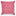 Square pink velvet pillow with slight shade variations, brand tag visible.