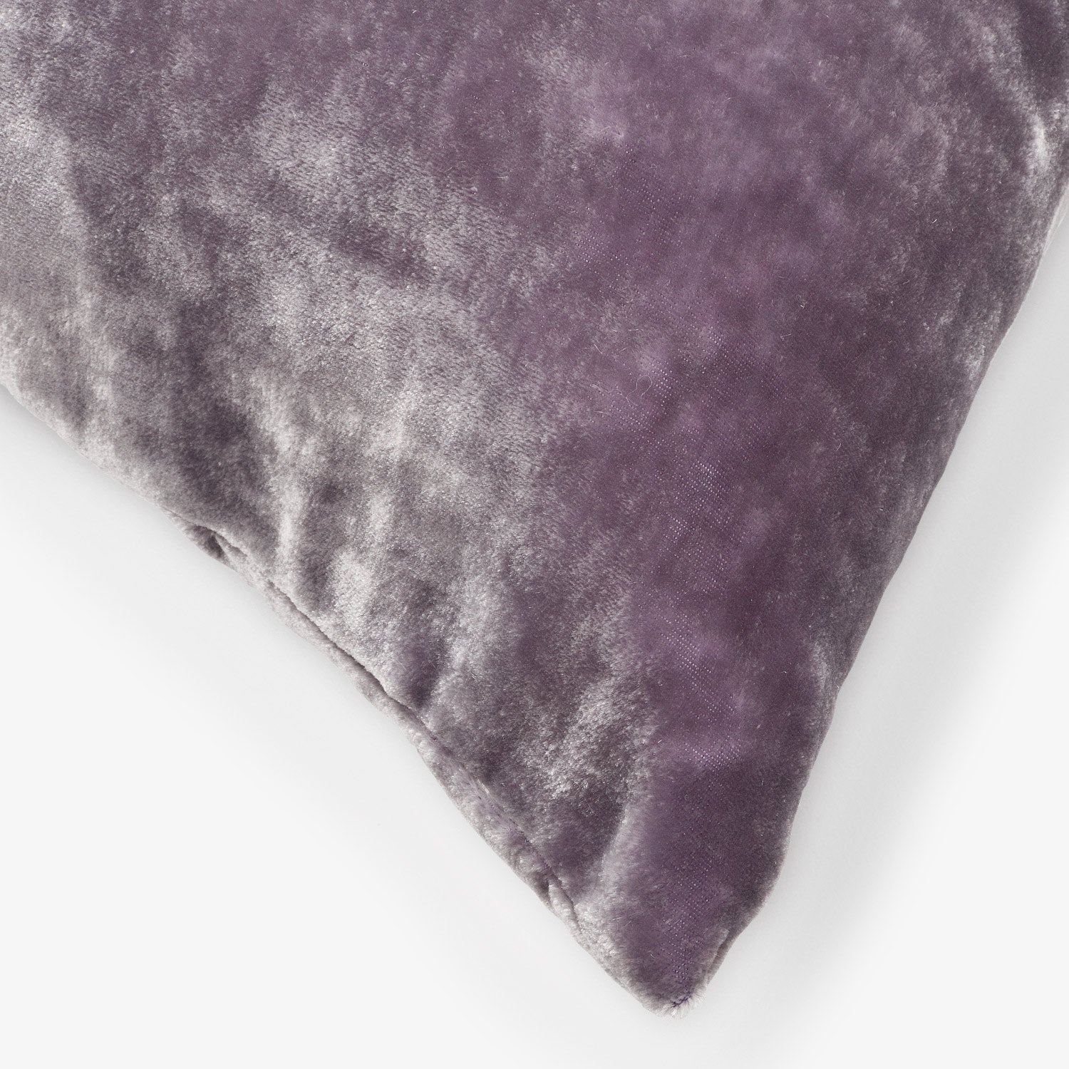 Close-up of rich purple velvet fabric with luxurious texture