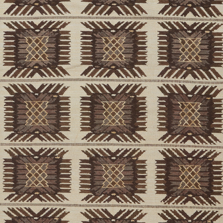 Intricate geometric pattern in earth tones resembles traditional textile design.