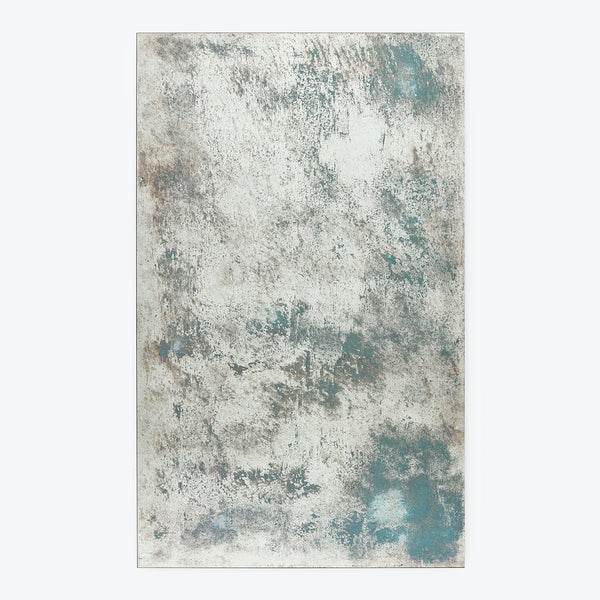 Abstract weathered texture with gray, white, and hints of blue.